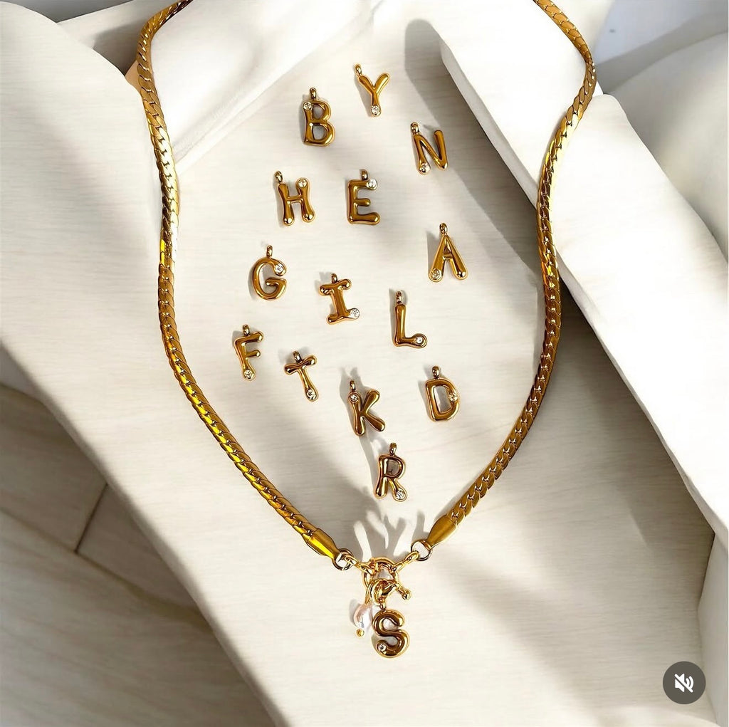 Necklace with letter with pearls