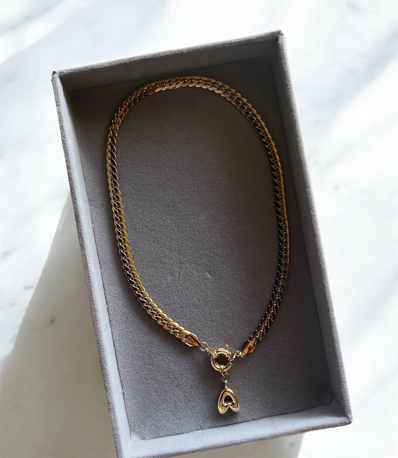 Necklace with letter