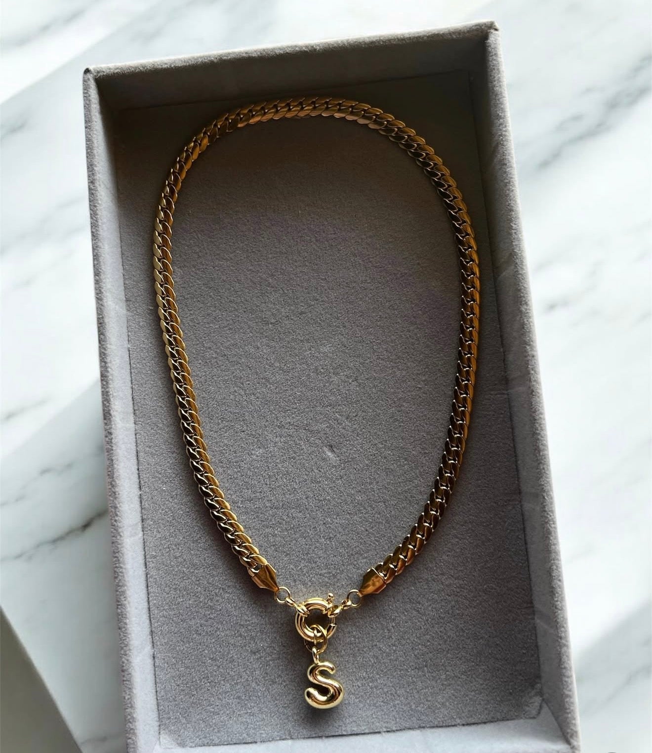 Necklace with letter